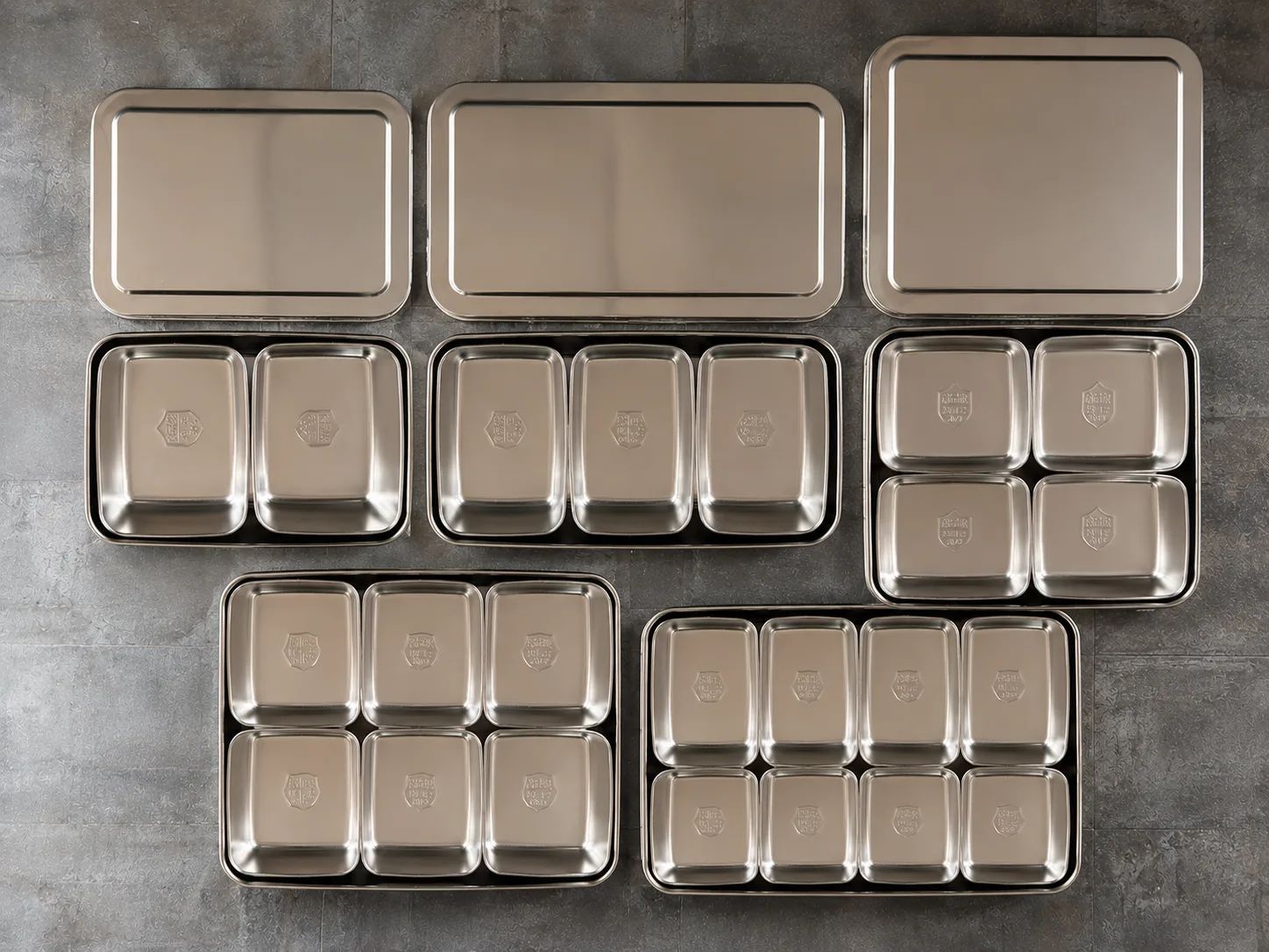 Metal container with compartments